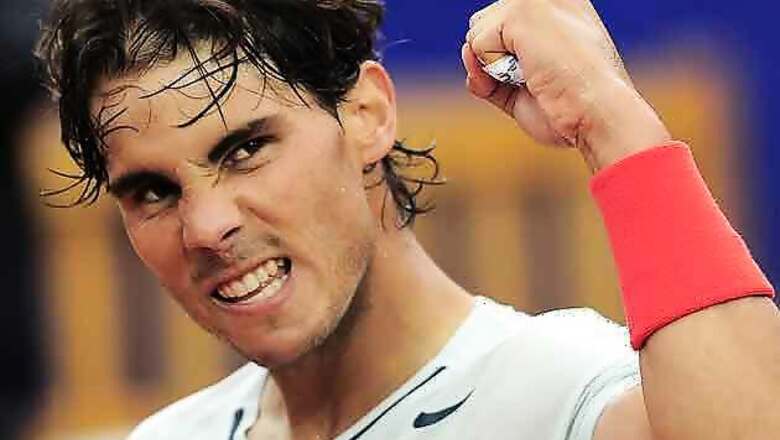 Nadal routs Raonic to close in on eighth Barcelona title