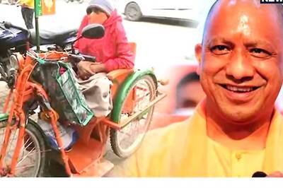 UP Elections 2022: Meet CM Yogi Adityanath’s Crazy Fan on a Saffron Tricycle