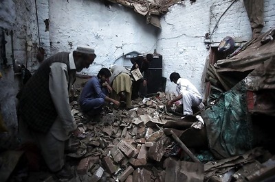 Rescuers race to reach quake zones in Afghanistan, Pakistan as toll nears 300