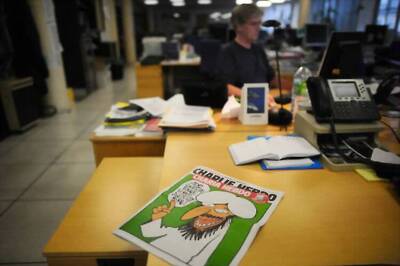 Jihadist shot dead attacking police on Charlie Hebdo anniversary