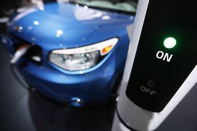 Top Automakers Fund Charging Sites to Boost Electric-Car Demand