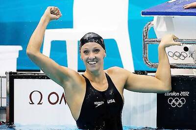Vollmer of US wins Olympic 100m butterfly gold