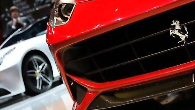 Luxury carmaker Ferrari trims forecasts after second-quarter profit falls