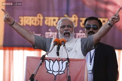 Man and myth collide as Modi eyes final ascent to power