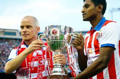 ISL champions Atletico de Kolkata showcase trophy to Atletico de Madrid fans