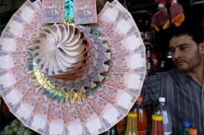 S&P downgrades India, cites fiscal weakness