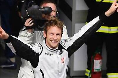 Button and Brawn take Formula One titles in Brazil