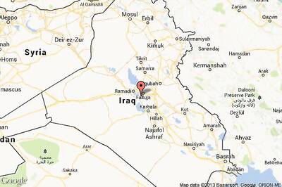 Bomb blast inside Iraq Sunni mosque kills 20 - police, medics