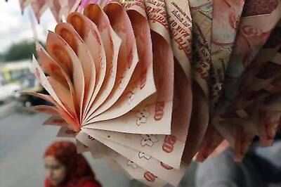 Rupee has first gain in New Year, up 10 paise to 62.16 vs $