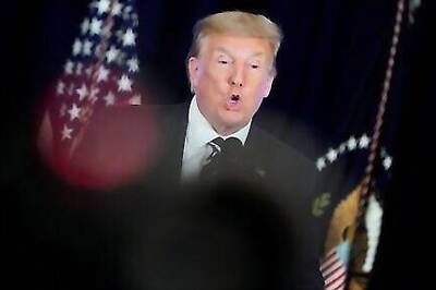 Trump defends U.S. Postal Service changes as Democrats mount pressure